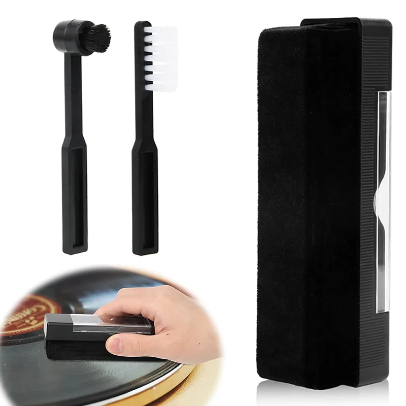 The three pieces of the set laid out: velvet block with clear cover, stylus brush and white nylon detail brush
